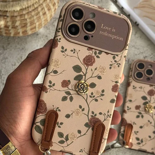 قاب موبایل آیفون گل رز فلورا قهوه ای + بندست چرمی C006041