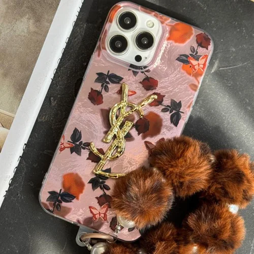 ⁨ قاب موبایل آیفون سن لورن دم روباهی پروانه گل سرخ + بندست پشمیC006670