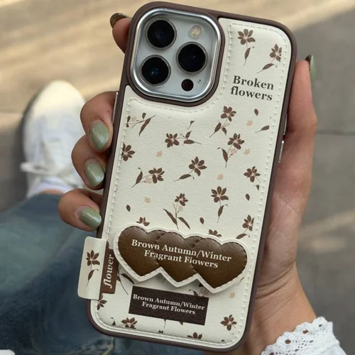 قاب موبایل آیفون گل چهارفصل فرگننت چرمی + استندقلبیC006433